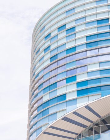 facade-of-a-modern-building-covered-in-reflective-2025-02-10-06-10-15-utc-scaled