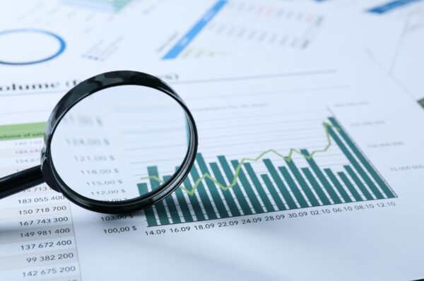 magnifying-glass-and-papers-with-diagrams-space-f-2025-03-24-14-52-43-utc-scaled