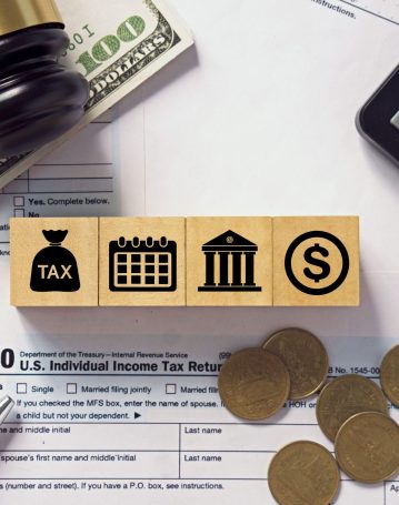 tax-concept-tax-icon-on-wooden-block-calculator-wi-2024-11-27-12-49-08-utc